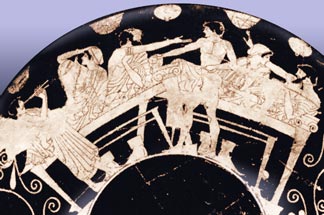 Symposium with hetaerae

Hetaerae (high-class prostitutes),
entertain their clients, while a 
young girl plays the flute. One 
of the men seems to be distracted 
by the wine boy.

Outside of red-figure kylix 
(wine cup), fifth century BCE.
Fogg Art Museum, Cambridge.

